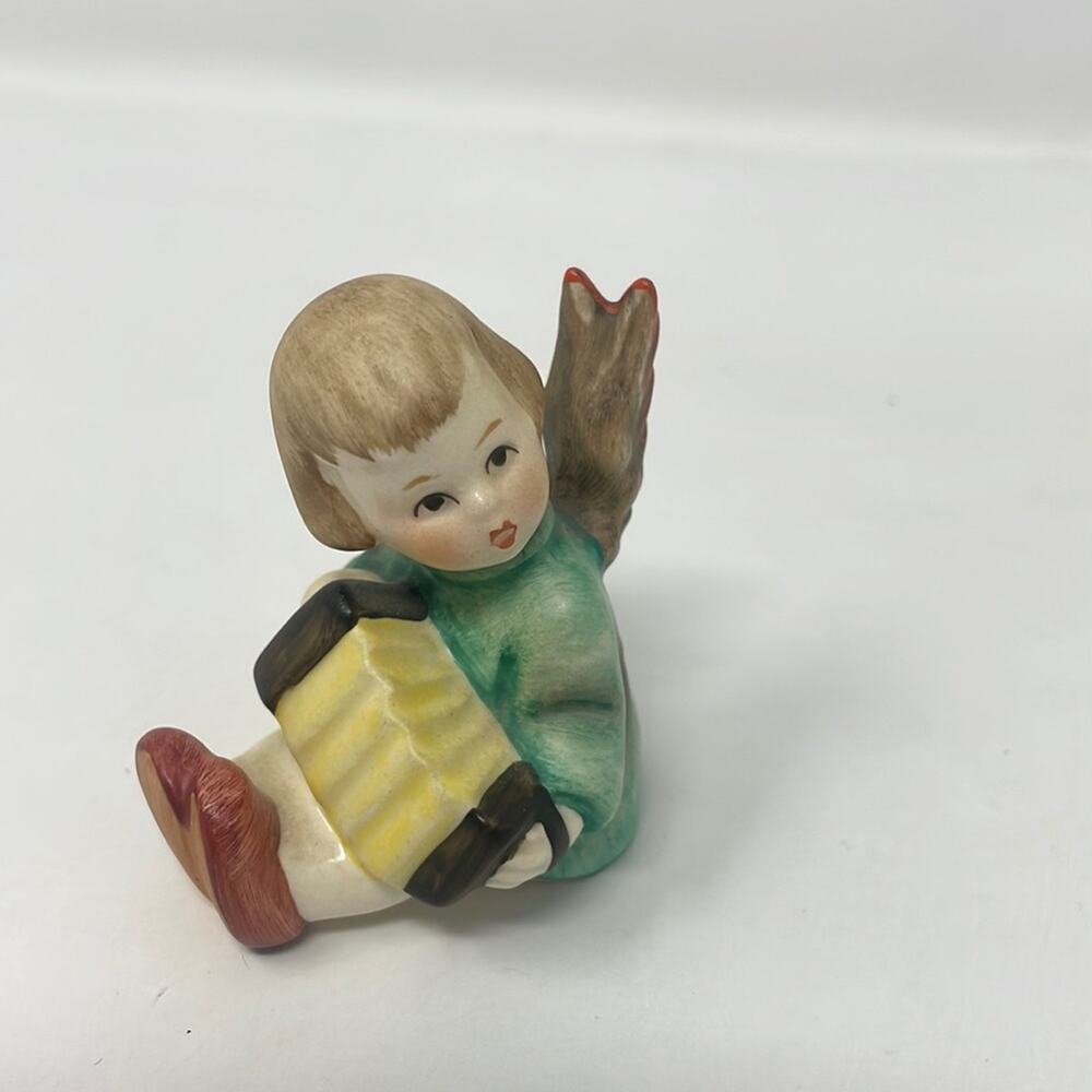 Vintage 1984 Goebel Hummel girl with accordion Figurine